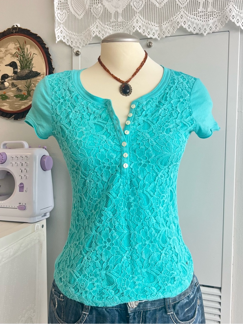 Aeropostale teal lace button up blouse with floral design